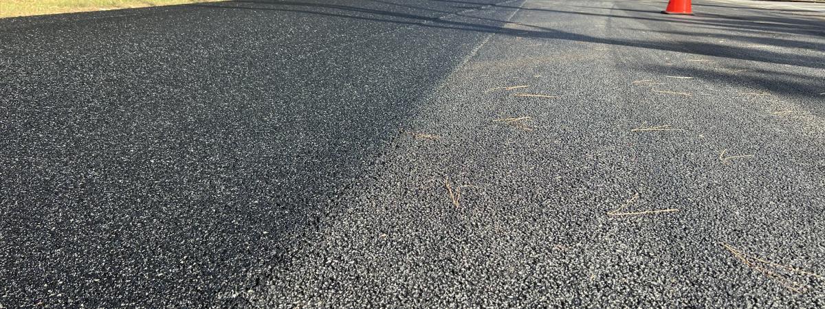 Road paved with asphalt mixed with crumbed rubber