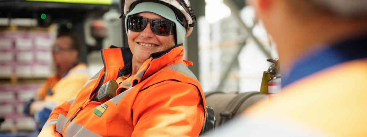 Female forklift driver smiling at Maldon cement works
