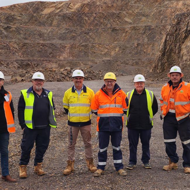 Boral Employees and Whyalla City Council members standing in quarry