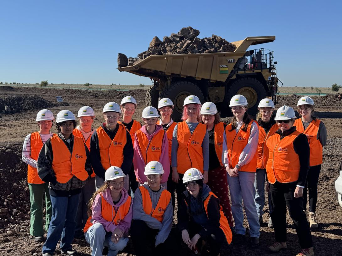Students with haul truck at Deer Park quarry