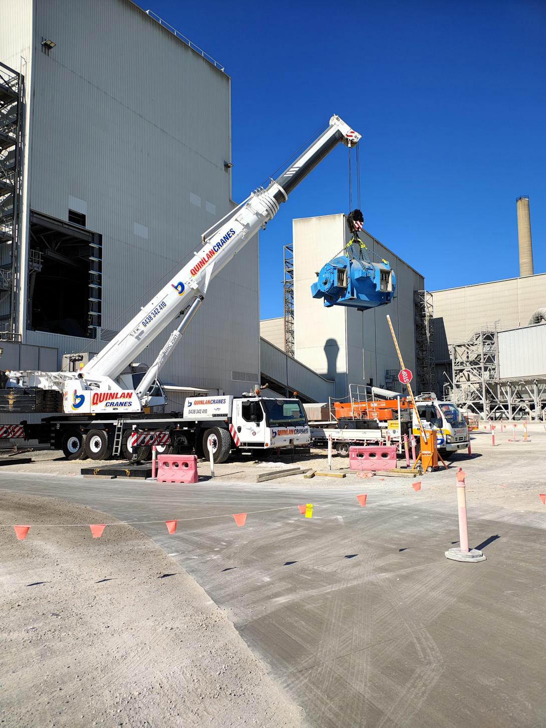 Motor mill hanging from crane